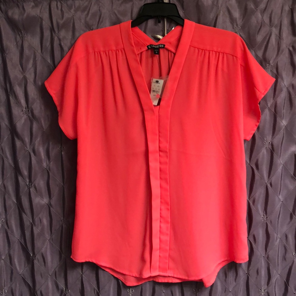 Bright colored flowing blouse